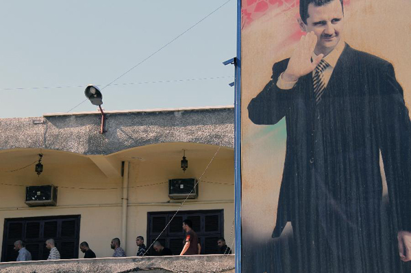 Freed detainees are seen upon their release in front of the Damascus Police Command in Damascus, Syria on 11 July 2012. The Syrian authorities released Tuesday a total of 275 detainees, who had been arrested over involvement with the anti-government movement, in a bid to show a good will to bring an end to the ongoing crisis at a time the opposition rejected Tuesday dialogue with the Syrian leadership. 